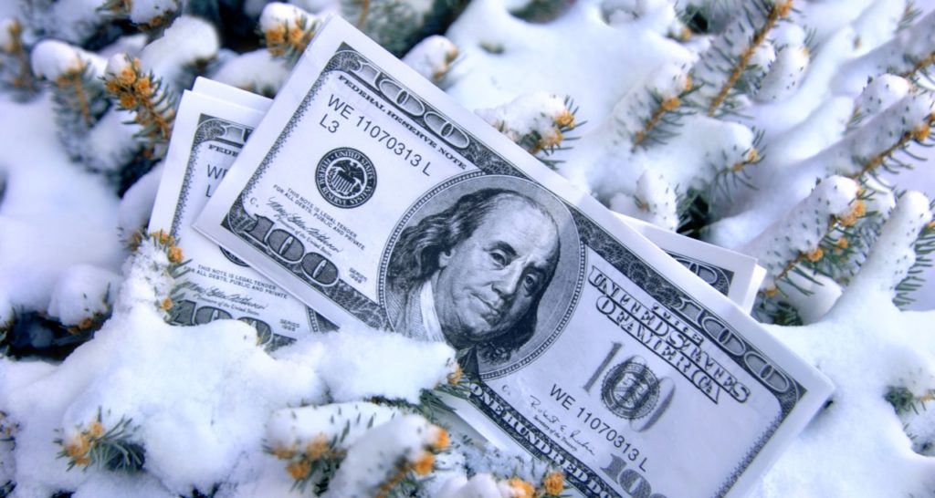 100-dollar bills in the snow
